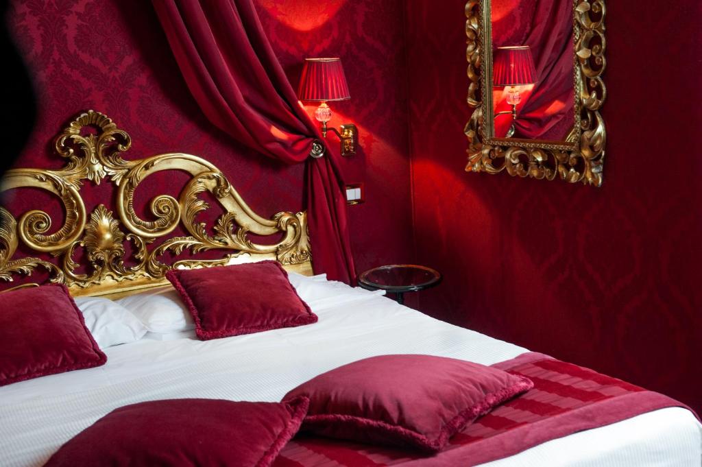 Postel nebo postele na pokoji v ubytování Hotel Al Duca Di Venezia