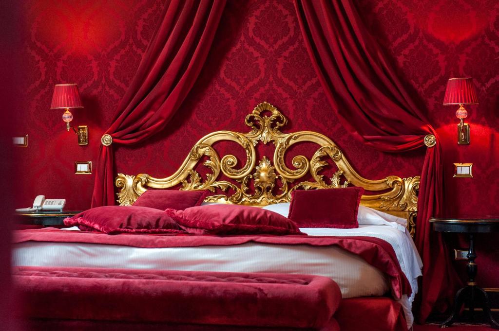 Postel nebo postele na pokoji v ubytování Hotel Al Duca Di Venezia
