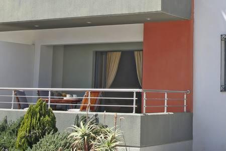 A balcony or terrace at Athina Apartment