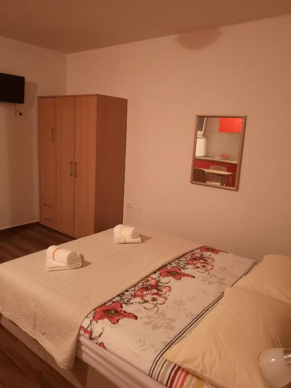 Postel nebo postele na pokoji v ubytování Apartmani Sea