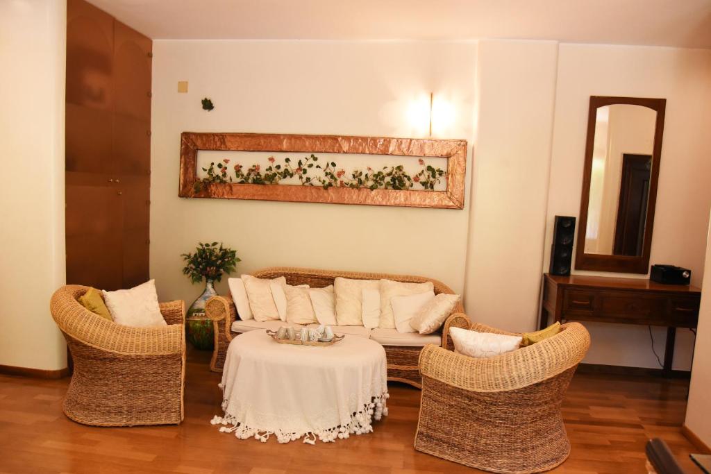 TV a/nebo společenská místnost v ubytování B&B Al Vecchio Glicine