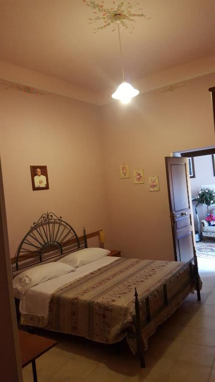 Łóżko lub łóżka w pokoju w obiekcie Locanda della Bottega