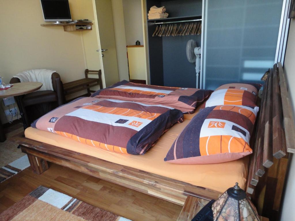 Postel nebo postele na pokoji v ubytování B & B Auf dem Wolf, St. Jakob