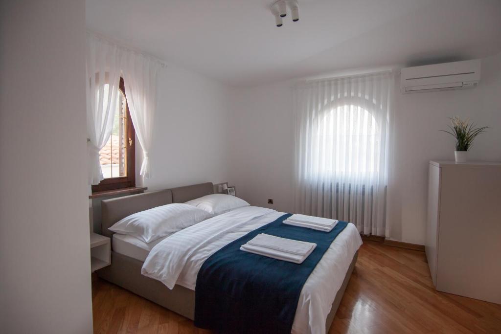 Postel nebo postele na pokoji v ubytování Villa Royale Krk