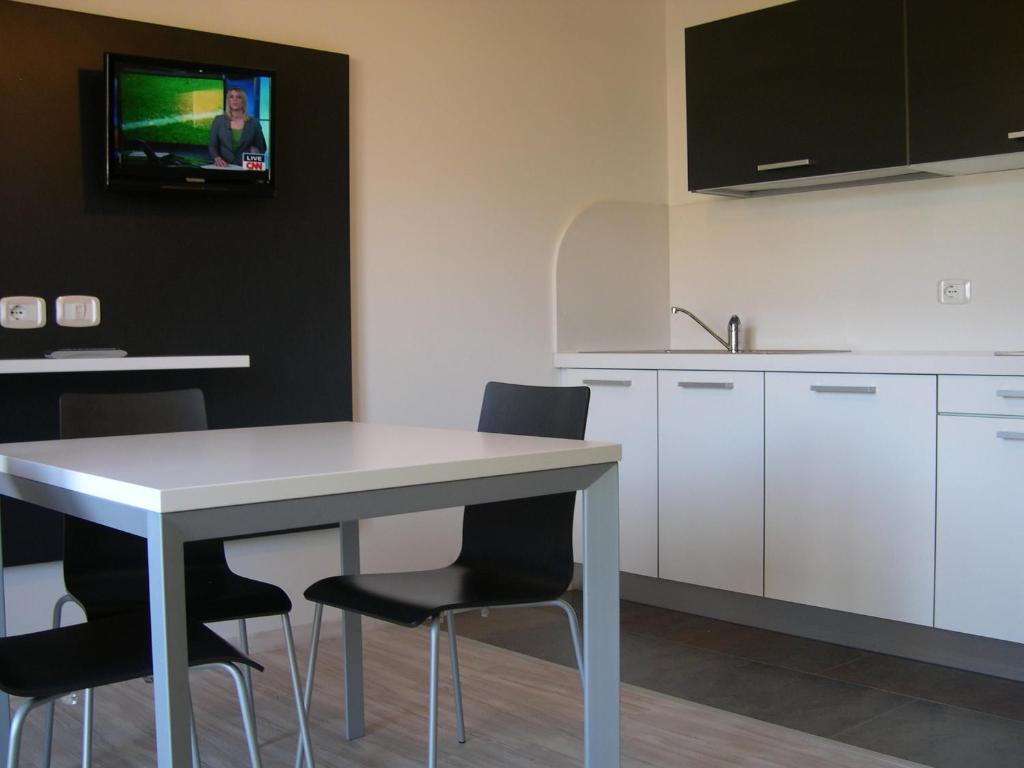 TV a/nebo společenská místnost v ubytování Ecohotel Primavera