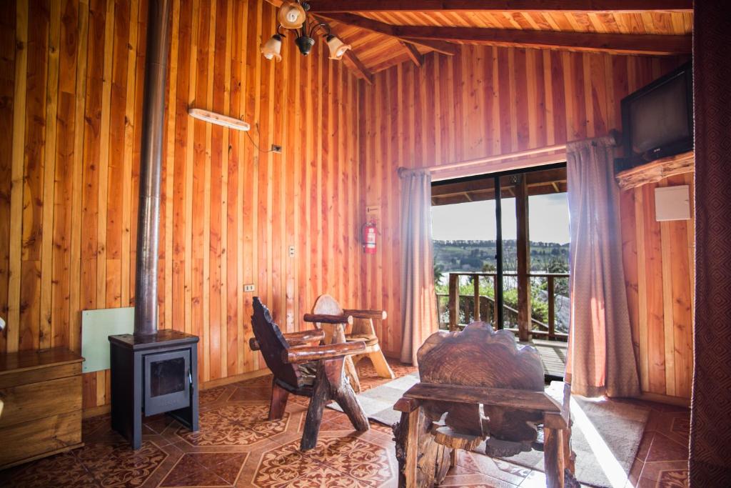 TV a/nebo společenská místnost v ubytování Apart hotel Puchaley Lafquen