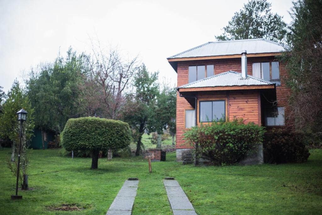 Zahrada ubytování Apart hotel Puchaley Lafquen