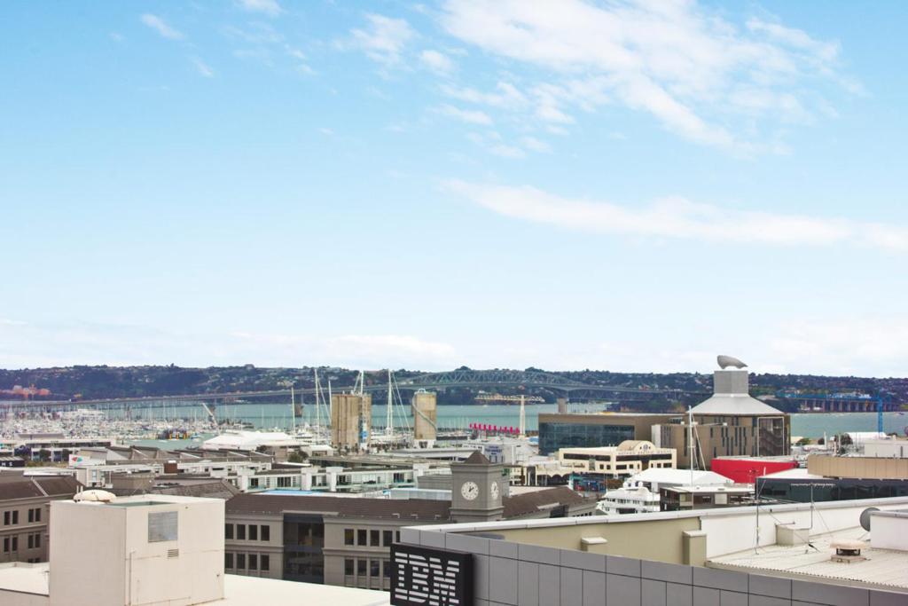 a view of a city from the roof of a building at QV Private City Hub Apartment - 484 in Auckland