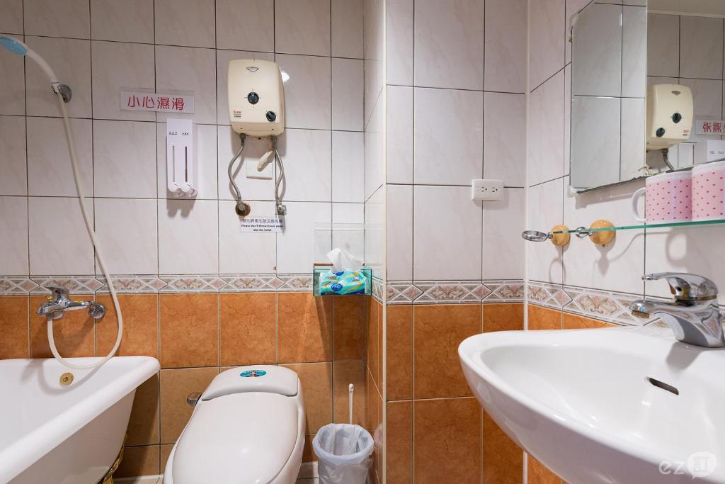 Koupelna v ubytování MB Hotel