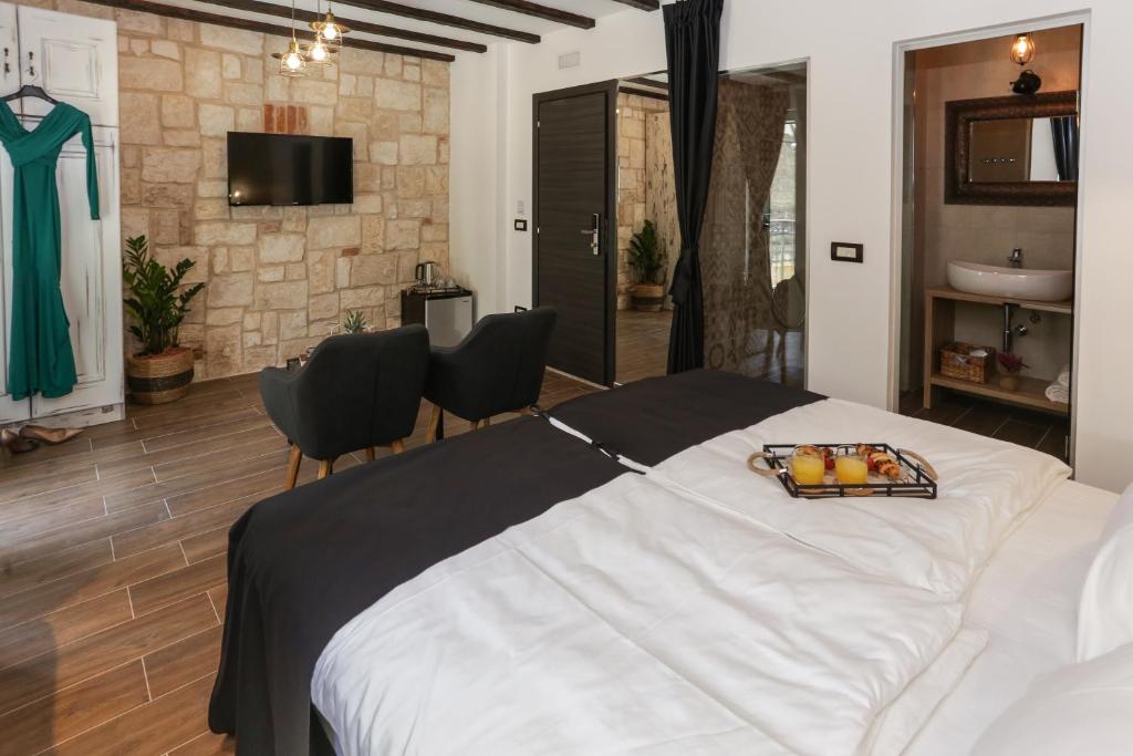 Posteľ alebo postele v izbe v ubytovaní Luxury Rooms Dino