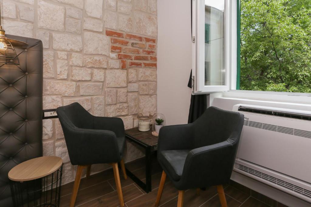 Posedenie v ubytovaní Luxury Rooms Dino