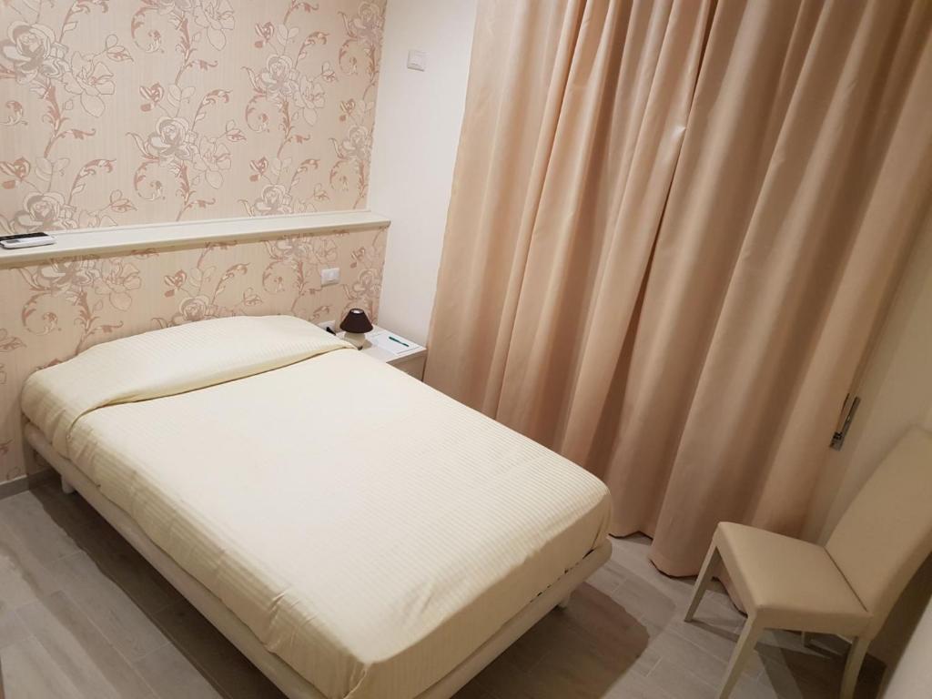Postel nebo postele na pokoji v ubytování La Suite