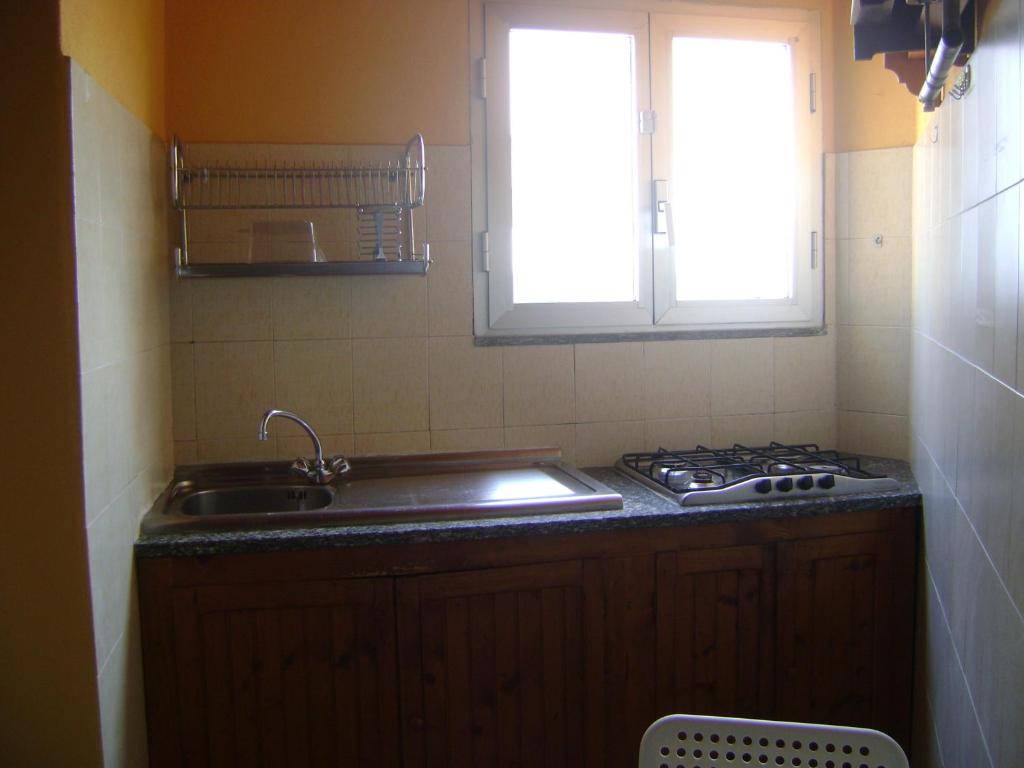 A kitchen or kitchenette at pedalando sul mare
