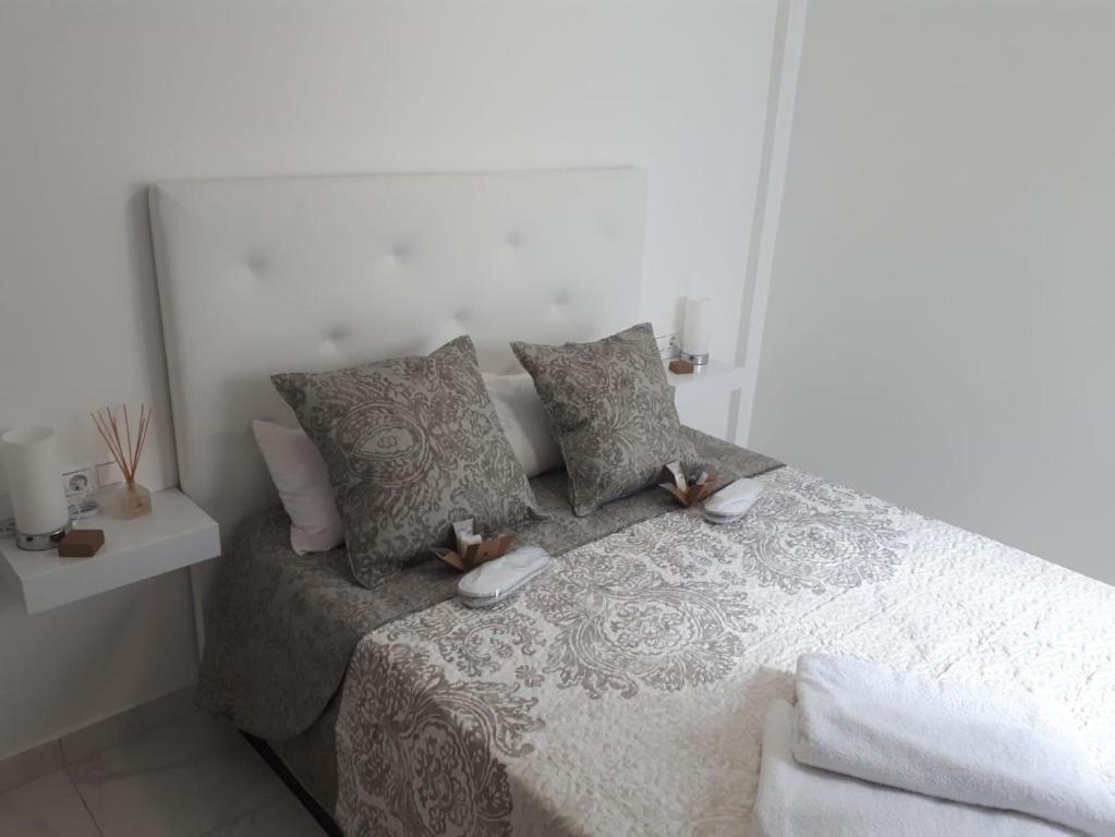 Postel nebo postele na pokoji v ubytování Appartement avec Solarium