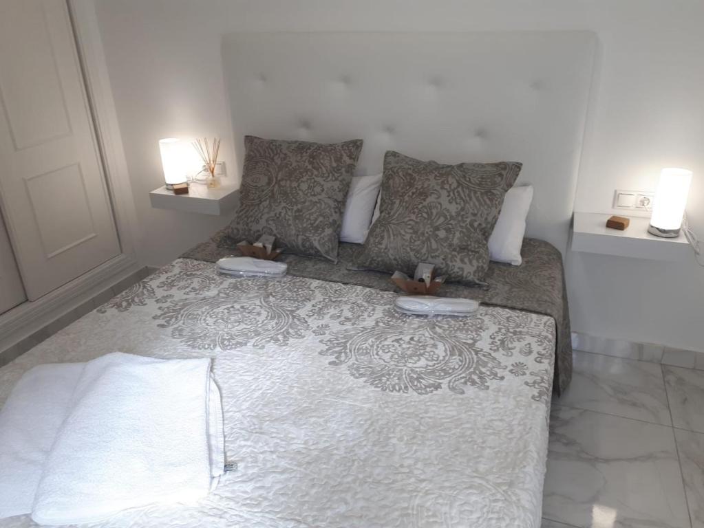 Postel nebo postele na pokoji v ubytování Appartement avec Solarium