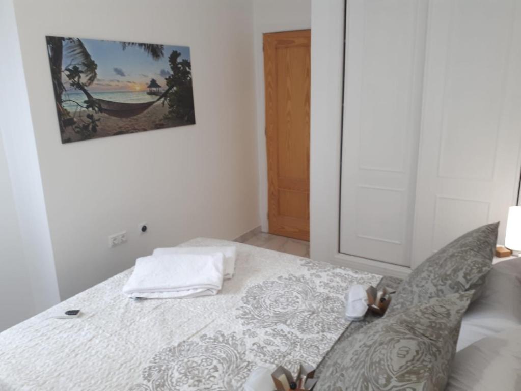 Postel nebo postele na pokoji v ubytování Appartement avec Solarium