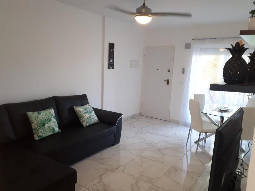 Posezení v ubytování Appartement avec Solarium