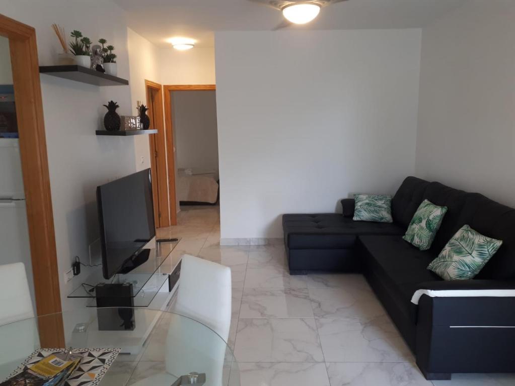 TV a/nebo společenská místnost v ubytování Appartement avec Solarium