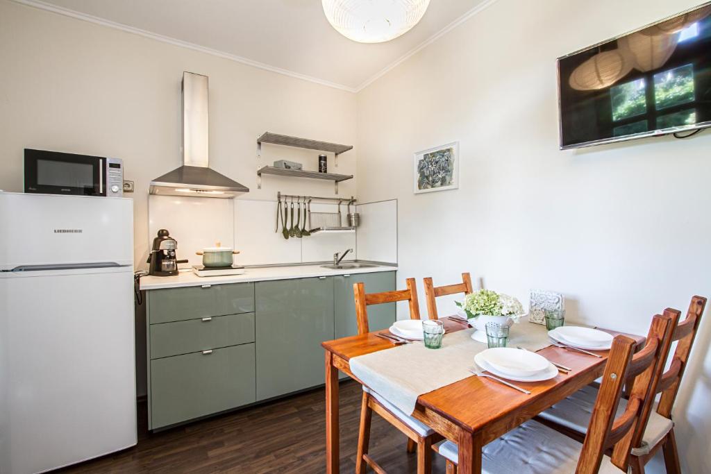Kuchyň nebo kuchyňský kout v ubytování Green Residence Élményközpont Velence