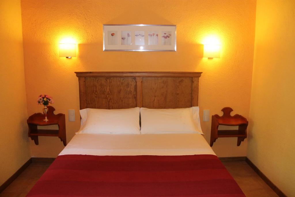 Postel nebo postele na pokoji v ubytování Apartaments La Taverna dels Noguers