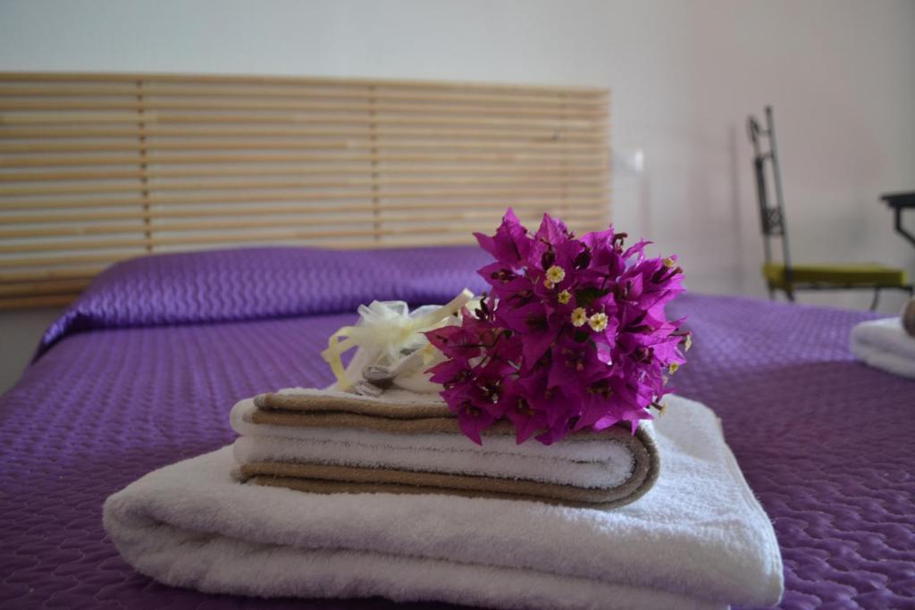 Łóżko lub łóżka w pokoju w obiekcie Horizon Pantelleria