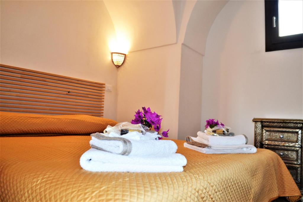 Łóżko lub łóżka w pokoju w obiekcie Horizon Pantelleria