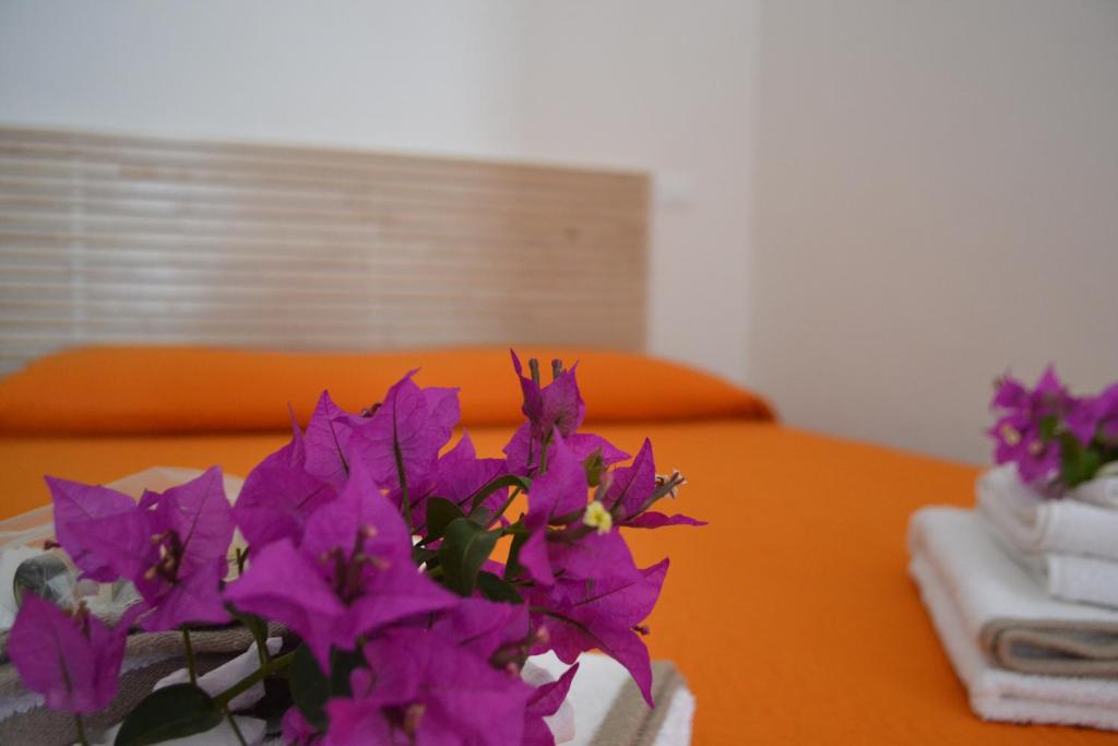 Łóżko lub łóżka w pokoju w obiekcie Horizon Pantelleria