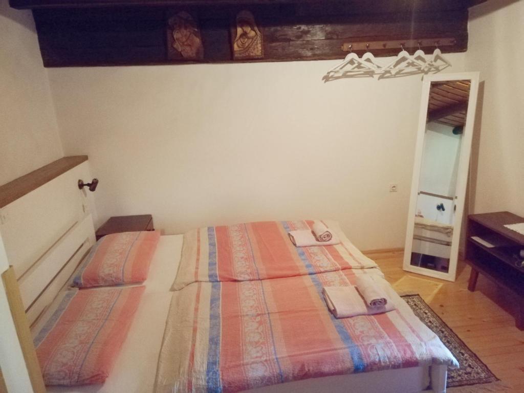 Postel nebo postele na pokoji v ubytování Guest House Turistična kmetija Plaznik