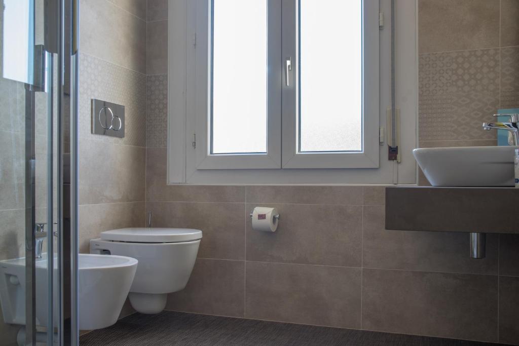 Koupelna v ubytování Hotel Villa Sorriso