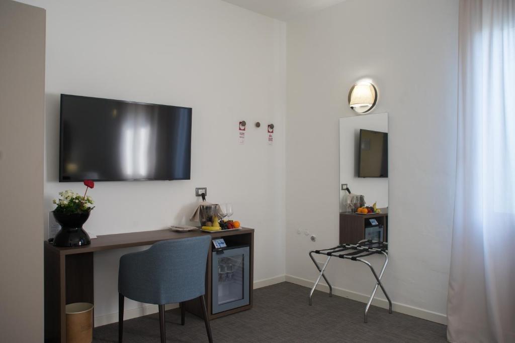 TV a/nebo společenská místnost v ubytování Hotel Villa Sorriso