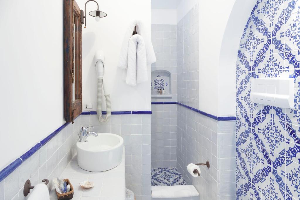 Koupelna v ubytování Quartara Boutique Hotel