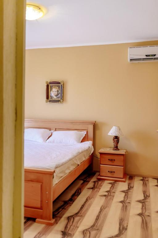 Postel nebo postele na pokoji v ubytování RUSTIC HOUSE LEKOVIĆ