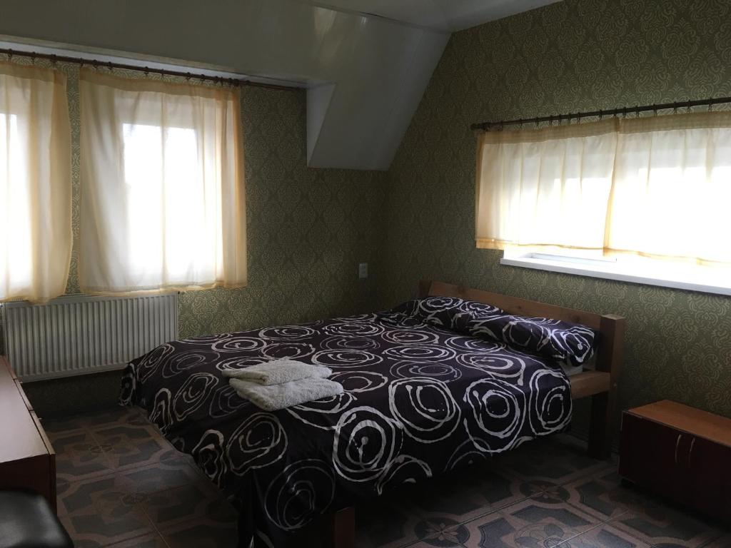 Postel nebo postele na pokoji v ubytování Хостел Благо