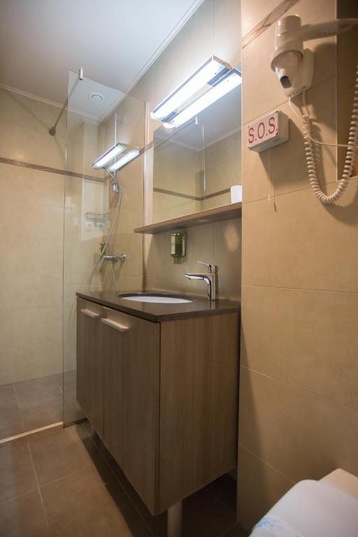 Koupelna v ubytování Garni Hotel Zenit