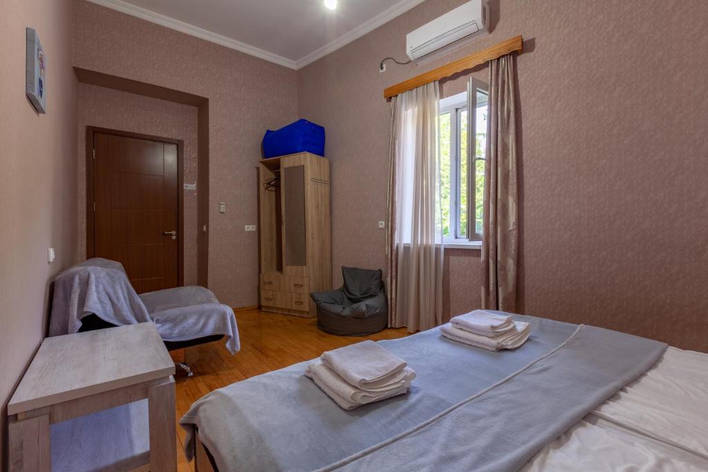 Postel nebo postele na pokoji v ubytování Guest House Keria