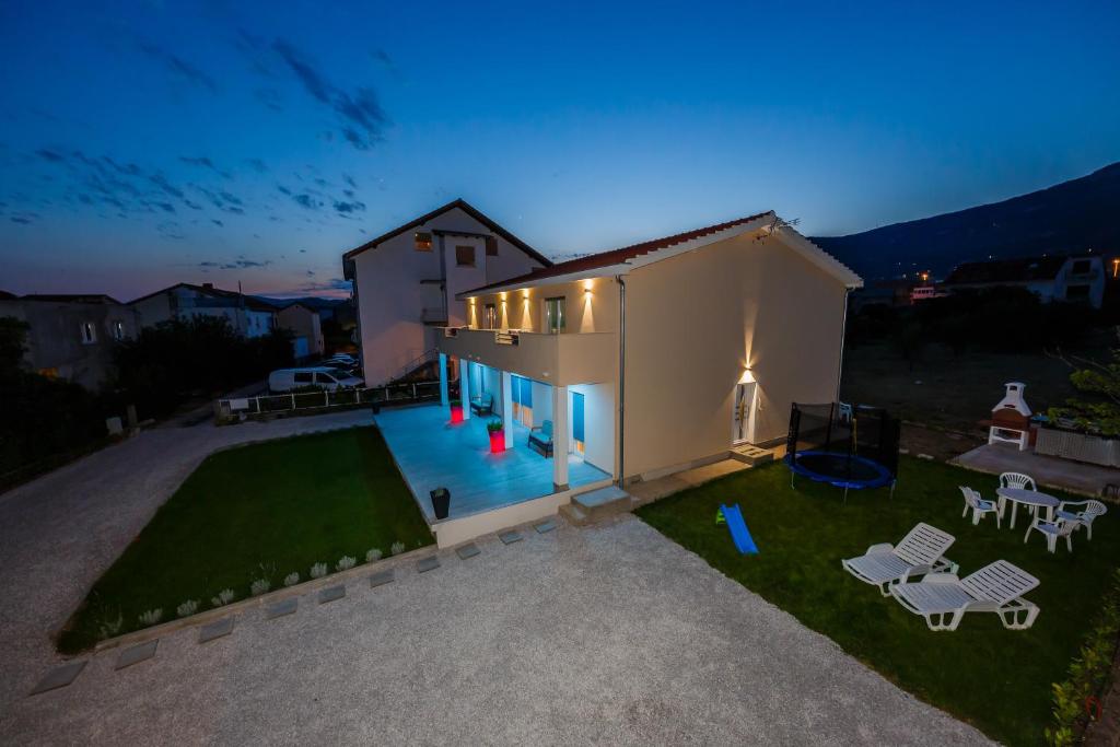 an aerial view of a house at night at Lavender & Mint in Kaštela