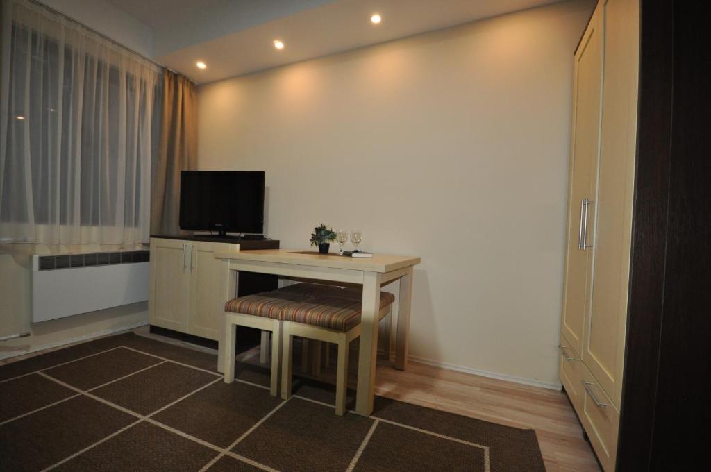 TV a/nebo společenská místnost v ubytování Apartments&Camping ZIP