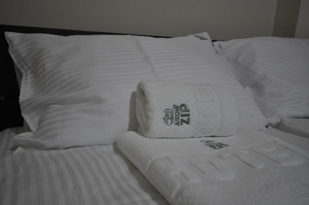 Postel nebo postele na pokoji v ubytování Apartments&Camping ZIP