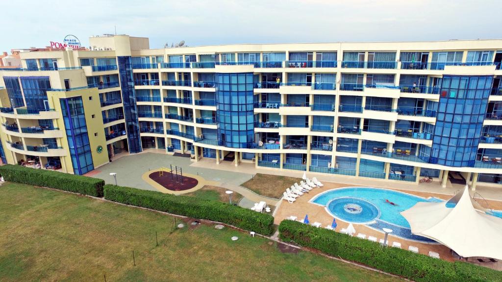 The swimming pool at or close to Aparthotel Marina Holiday Club - All Inclusive & Free Parking