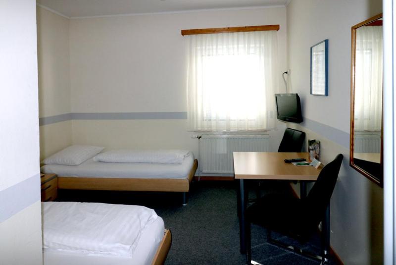 Postel nebo postele na pokoji v ubytování Schlafgut