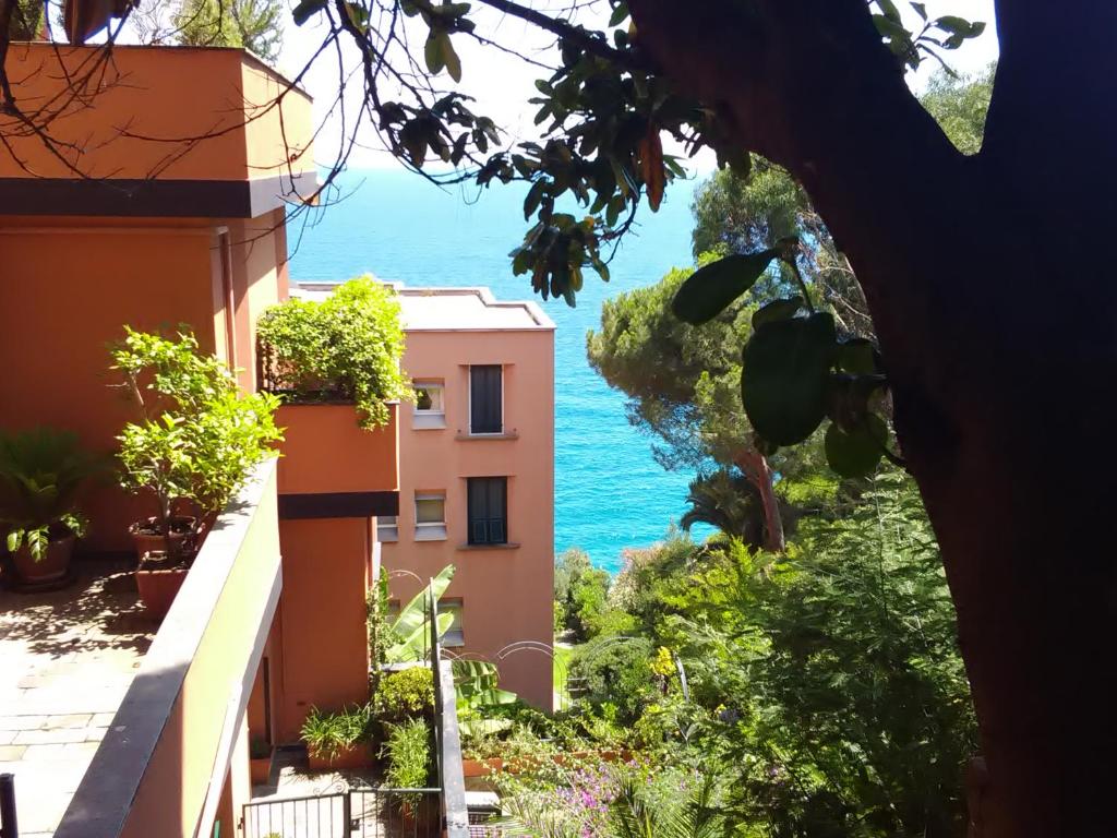 a view of the ocean from a building at Casa delle mimose in Varazze