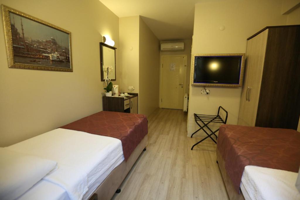 TV a/nebo společenská místnost v ubytování Canakkale Bogaz Hotel