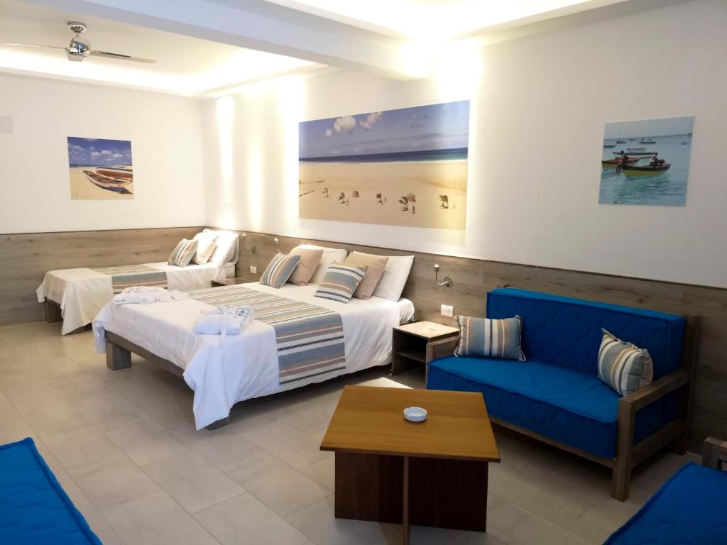 Postel nebo postele na pokoji v ubytování Sobrado Boutique Hotel