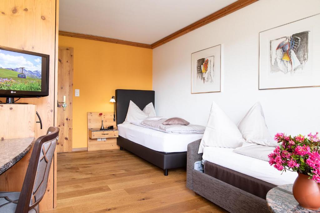TV a/nebo společenská místnost v ubytování Hotel Hohe Promenade