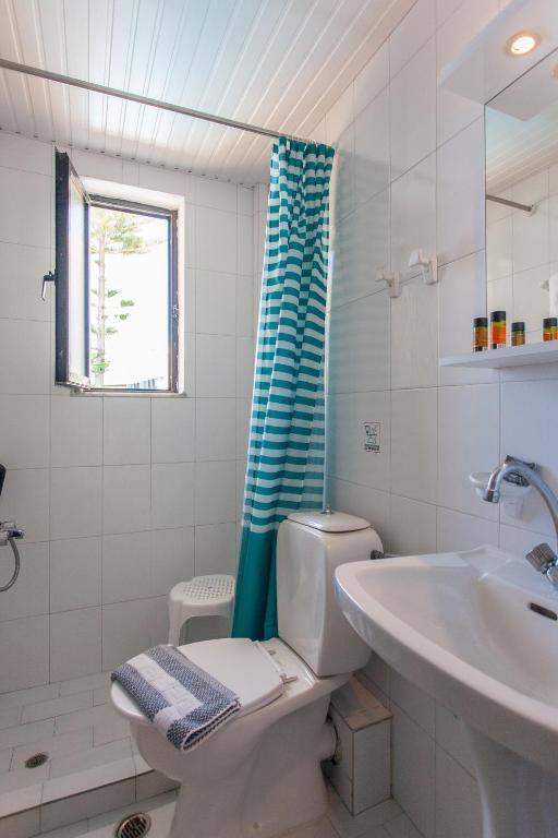 Koupelna v ubytování Akasti Hotel