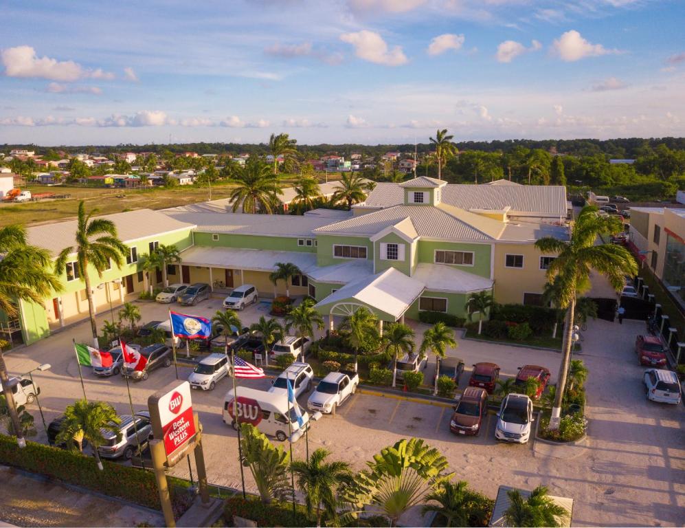 an aerial view of a house with a parking lot at Best Western Plus Belize Biltmore Plaza in Belize City