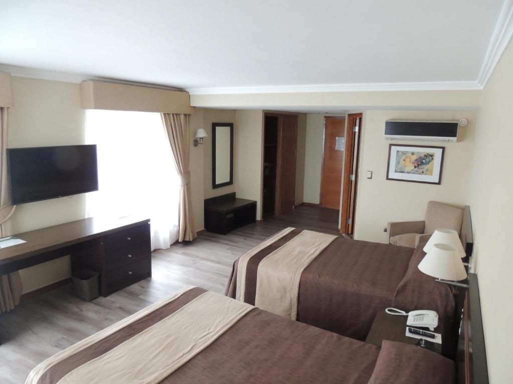 TV a/nebo společenská místnost v ubytování Hotel Diego de Almagro Valparaíso