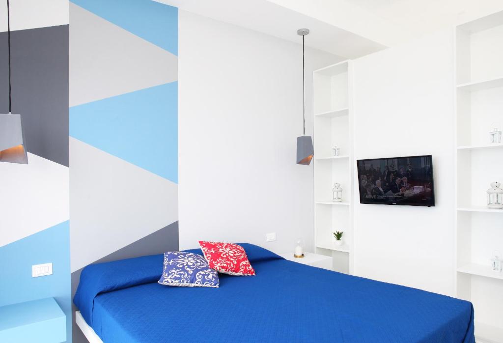 Łóżko lub łóżka w pokoju w obiekcie Sea Windows Suite