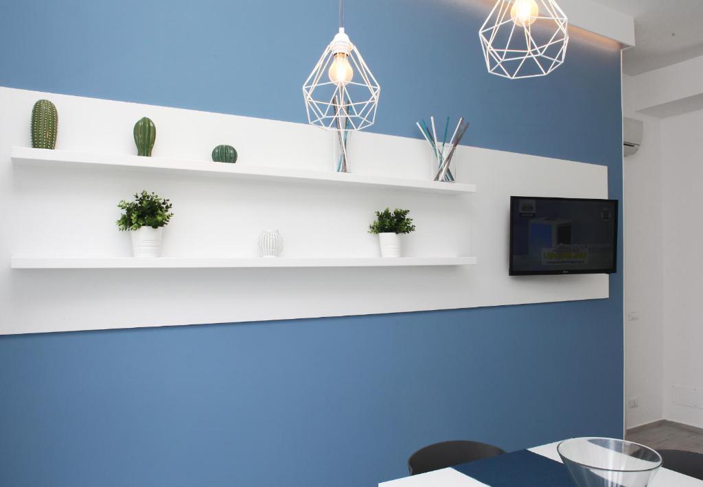 Telewizja i/lub zestaw kina domowego w obiekcie Sea Windows Suite