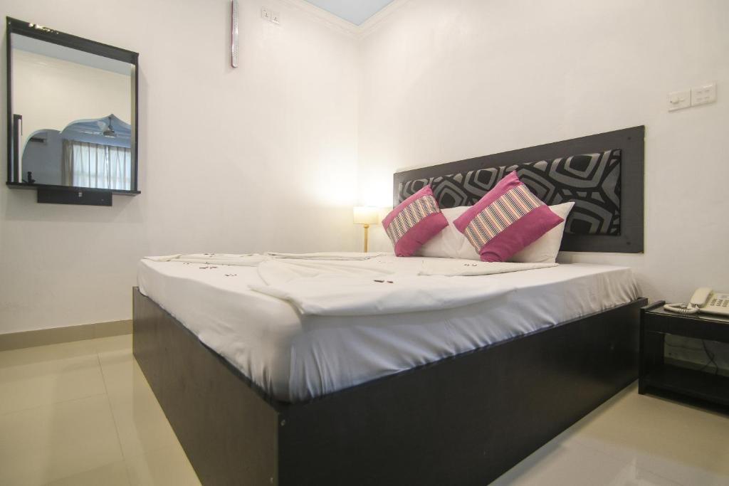 Postel nebo postele na pokoji v ubytování Azoush Tourist Guesthouse